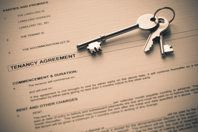 A tenancy agreement with standard terms and a set of house keys.